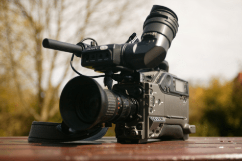 a big-sized camera on the table